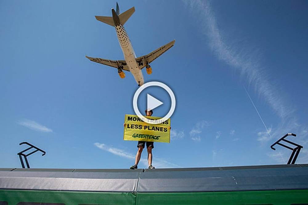 greenpeace more trains less planes