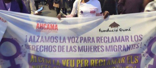 Procés de regularització de persones migrades a Espanya.